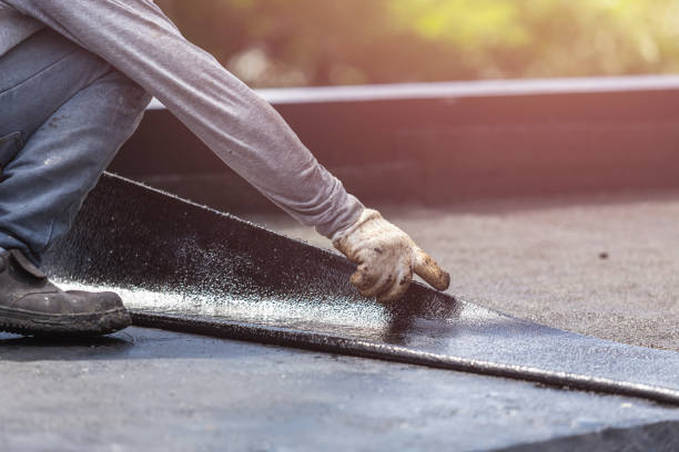 Professional Waterproofing technician working in Huntsville, AL